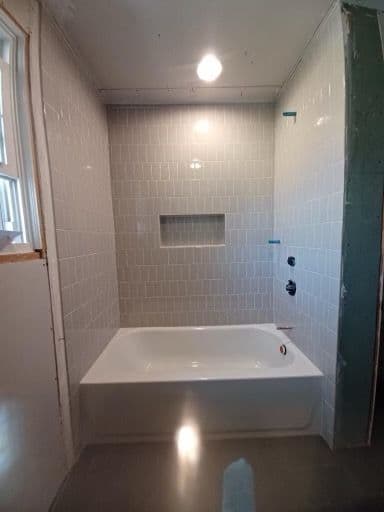 Modern Bathroom Makeover with Elegant Transformations Construction