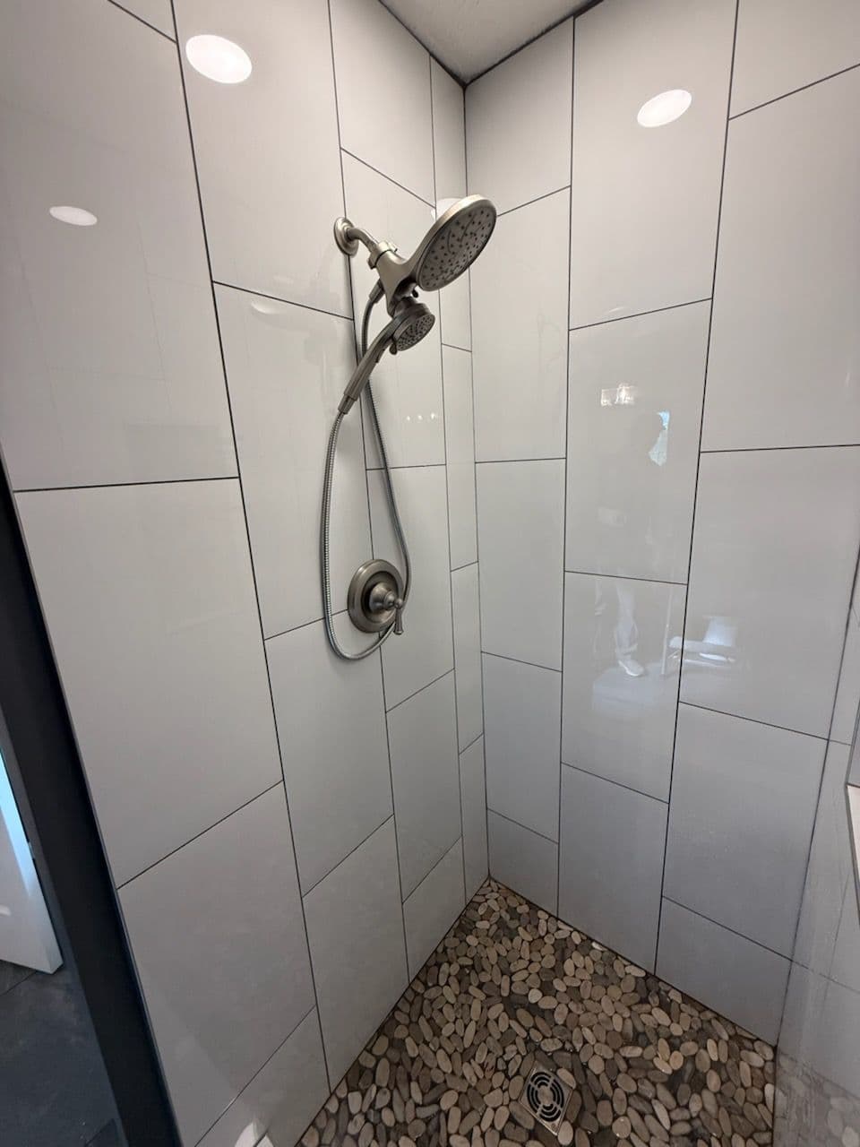 Gallery photos for Sleek Bathroom Remodel with Modern White Tiles: Image #1